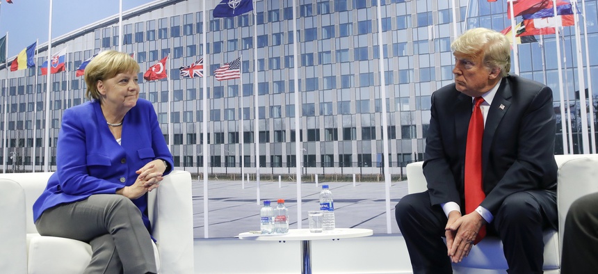President Donald Trump and German Chancellor Angela Merkel during their bilateral meeting, Wednesday, July 11, 2018 in Brussels, Belgium.