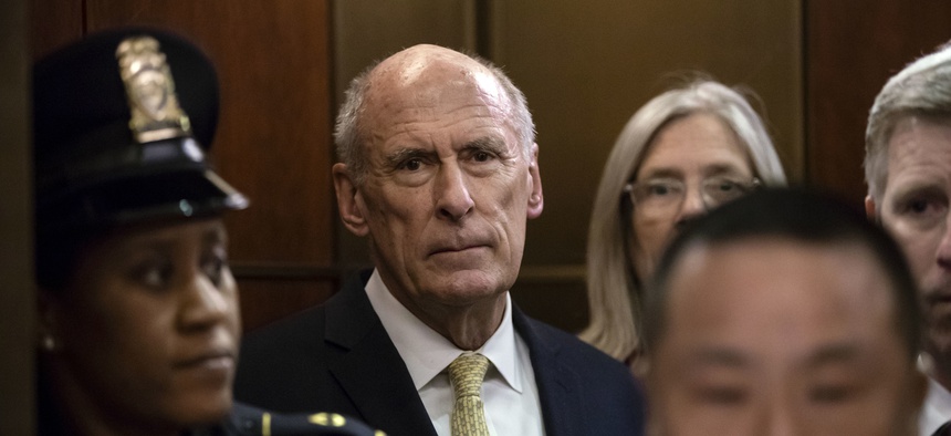 Director of National Intelligence Dan Coats arrives as House and Senate lawmakers from both parties gather for a classified briefing in a secure room about the federal investigation into President Donald Trump's 2016 campaign, on Capitol Hill May 24, 2018