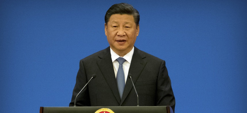Chinese President Xi Jinping speaks during the opening session of the 8th Ministerial Meeting of the China-Arab States Cooperation Forum in Beijing, Tuesday, July 10, 2018