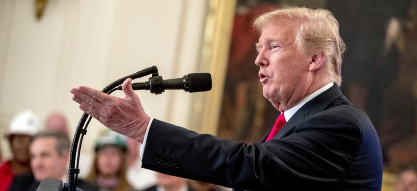 President Donald Trump speaks before signing an Executive Order that establishes a National Council for the American Worker during a ceremony in the East Room of the White House, Thursday, July 19, 2018, in Washington.