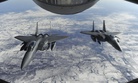 The proposed F-15X will have a one-person cockpit, not the pilot-and-weaponeer team in these F-15E Strike Eagles.