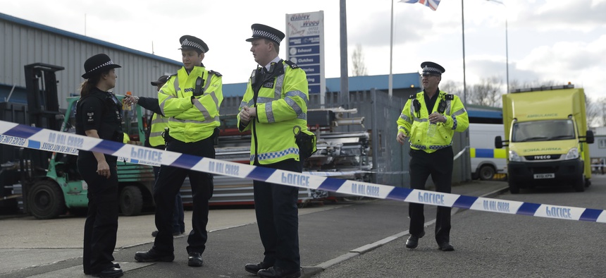 olice officers secure a cordon outside the vehicle recovery business "Ashley Wood Recovery" in Salisbury, England, Tuesday, March 13, 2018.