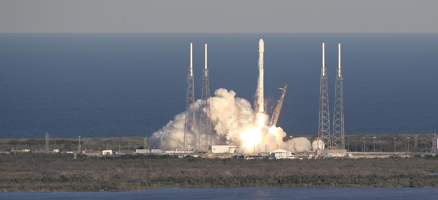 A SpaceX Falcon 9 rocket transporting the Tess satellite lifts off from launch complex 40 at the Cape Canaveral Air Force Station in Cape Canaveral, Fla., Wednesday, April 18, 2018.