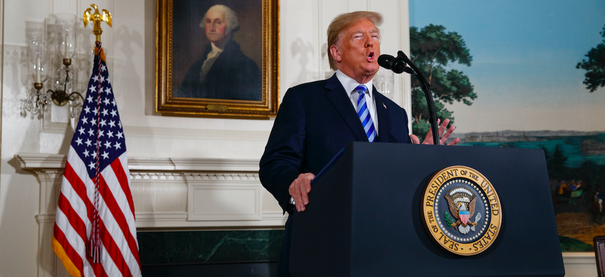 President Donald Trump delivers a statement on the Iran nuclear deal from the Diplomatic Reception Room of the White House, Tuesday, May 8, 2018, in Washington.