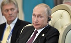 ussian President Vladimir Putin and presidential spokesman Dmitry Peskov, left, attend a meeting during the 5th Caspian summit in Aktau, the Caspian Sea port in Kazakhstan, Sunday, Aug. 12, 2018. ussian President Vladimir Putin and presidential spokesman Dmitry Peskov, left, attend a meeting during the 5th Caspian summit in Aktau, the Caspian Sea port in Kazakhstan, Sunday, Aug. 12, 2018.