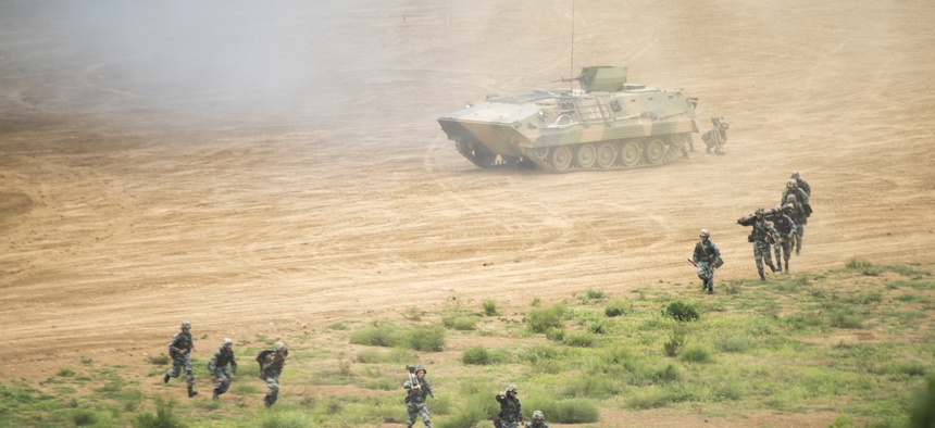 An attack exercise with People's Liberation Army Gen. Song Puxuan, commander, Northern Theater Command, at a PLA base in Shenyang, China, Aug. 16, 2017.