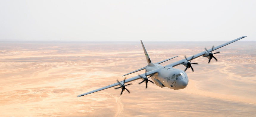 A C-130J Hercules aircraft from the 115th Airlift Squadron at Channel Islands Air National Guard Station, Calif., flies over Jordan during Exercise Eager Lion May 31, 2014, at an air base in northern Jordan.