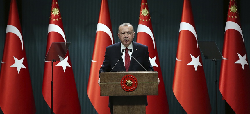 Turkey's President Recep Tayyip Erdogan announces early presidential and parliamentary elections for June 24, 2018, at the Presidential Palace, in Ankara, Turkey, Wednesday, April 18, 2018.