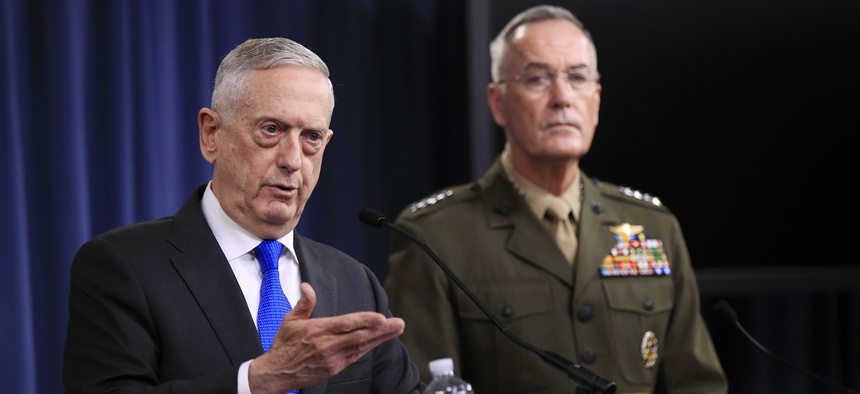 Secretary of Defense Jim Mattis, left, and Chairman of the Joint Chiefs of Staff, Marine Gen. Joseph Dunford speak to reporters during a news conference at the Pentagon, Tuesday, Aug. 28, 2018 in Washington.