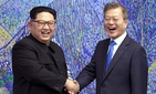 In this April 27, 2018 file photo, North Korean leader Kim Jong Un, left, poses with South Korean President Moon Jae-in for a photo inside the Peace House at the border village of Panmunjom in Demilitarized Zone, South Korea. In this April 27, 2018 file photo, North Korean leader Kim Jong Un, left, poses with South Korean President Moon Jae-in for a photo inside the Peace House at the border village of Panmunjom in Demilitarized Zone, South Korea.