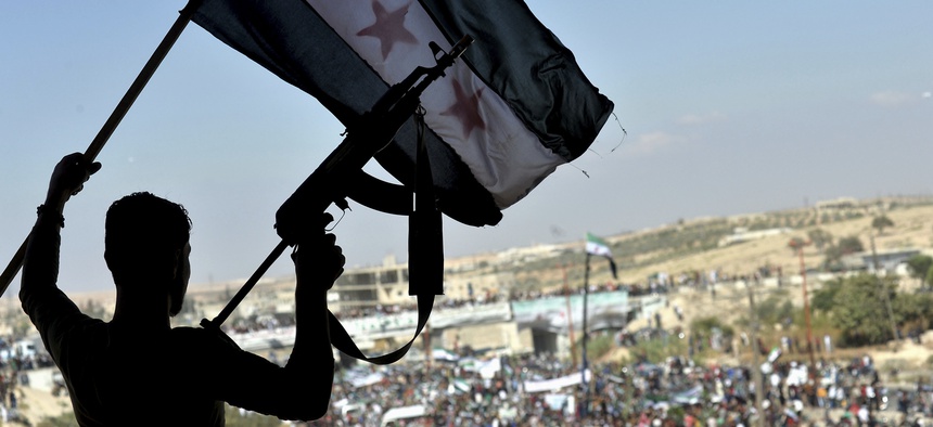 Thousands of protesters attend a demonstration against the Syrian government offensive to Idlib, in the northwestern town of Maarat al-Numan, also known as al-Maʿarra, south of Idlib, Syria, Friday, Sept 14, 2018.
