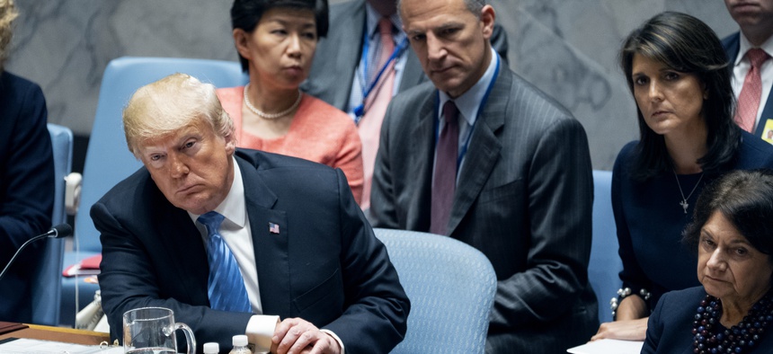 President Donald Trump listens to a council member at a United Nations Security Council meeting during the 73rd session of the United Nations General Assembly, at U.N. headquarters, Wednesday, Sept. 26, 2018.