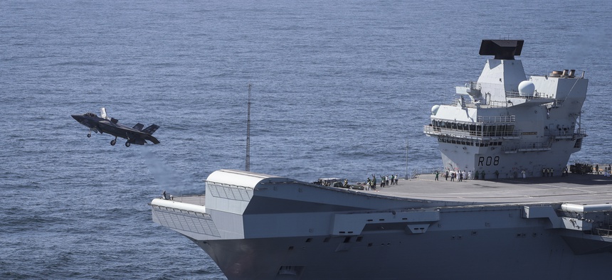 Commander Nathan Gray RN, Makes the first ever F-35B Lightning II jet take off from HMS Queen Elizabeth.