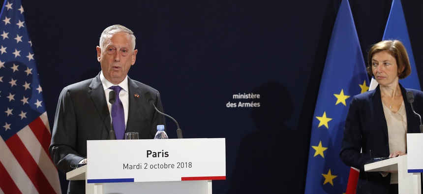 U.S Defense Secretary Jim Mattis, left, and French counterpart Florence Parly attend a joint press conference in Paris, Turesday, Oct.2, 2018.