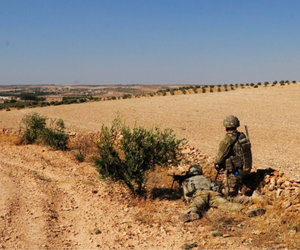U.S. Soldiers provide security during an independent, coordinated patrol outside Manbij, Syria, August 19, 2018. U.S. Soldiers provide security during an independent, coordinated patrol outside Manbij, Syria, August 19, 2018.