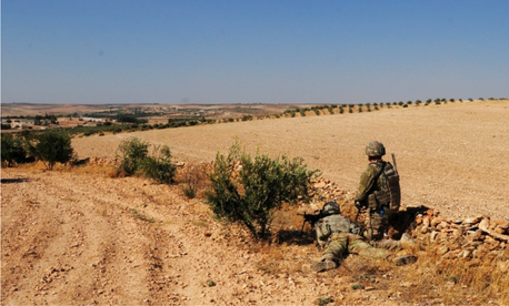 U.S. Soldiers provide security during an independent, coordinated patrol outside Manbij, Syria, August 19, 2018. U.S. Soldiers provide security during an independent, coordinated patrol outside Manbij, Syria, August 19, 2018.