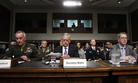 Defense Secretary Jim Mattis, center, flanked by Joint Chiefs Chairman Gen. Joseph Dunford, left, and Defense Undersecretary David Norquist, prepares to testify June 13, 2017, before a Senate Armed Services Committee.