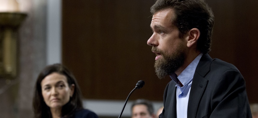 Twitter CEO Jack Dorsey, accompanied by Facebook COO Sheryl Sandberg, testify before the Senate Intelligence Committee hearing on 'Foreign Influence Operations and Their Use of Social Media Platforms' on Capitol Hill, Wednesday, Sept. 5, 2018, in DC.