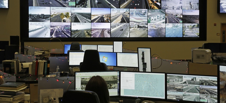 Screens show the feeds from traffic cameras at the Regional Transportation Commission of Southern Nevada's FAST traffic management center, Tuesday, Dec. 6, 2016, in Las Vegas.