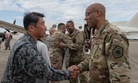 Japan Air Self-Defense Force Lt. Gen. Tamotsu Kidono and U.S. Air Force Gen. CQ Brown shake hands at Misawa Air Base, Japan.