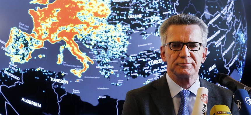 German Interior Minister Thomas de Maiziere talks to the media during his visit of the central point of fighting internet criminality (ZIT) in Giessen, Germany, Wednesday, Feb. 8, 2017.