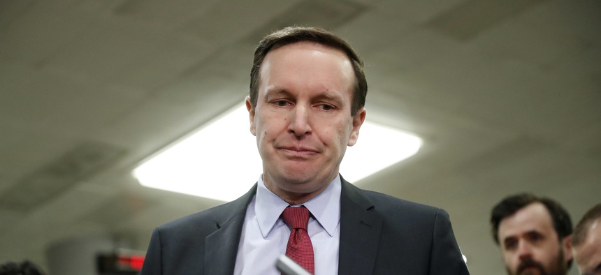 Sen. Chris Murphy, D-Conn., pauses while speaking to members of the media after leaving a closed door meeting about Saudi Arabia, Wednesday, Nov. 28, 2018, on Capitol Hill in Washington.