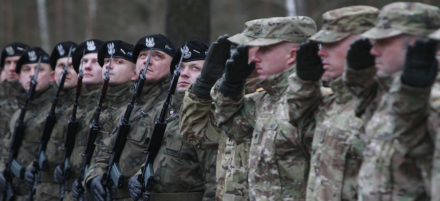 U.S. Army soldiers are welcomed in Zagan, Poland, Thursday, Jan. 12, 2017.