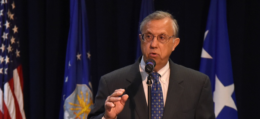 Shay Assad, the Pentagon's Director of Defense Pricing, speaks to the audience at the SMC’s 2017 Space Contracting Executive Forum at Los Angeles Air Force Base in El Segundo, Calif., Aug. 23, 2017.
