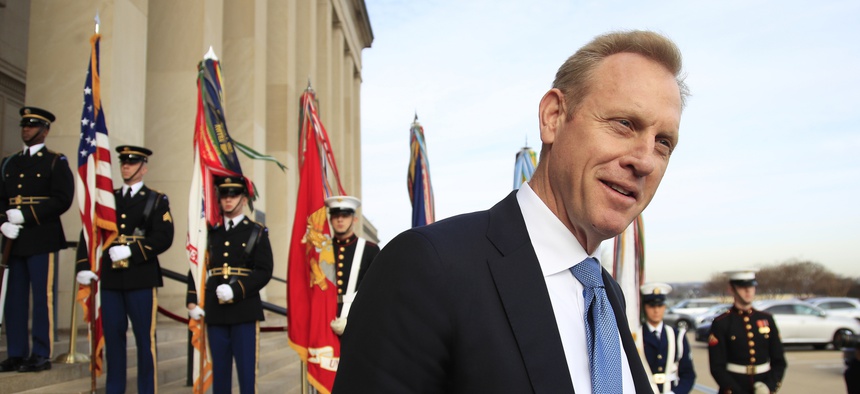 In this Wednesday, Dec. 19, 2018, file photo, Deputy Defense Secretary Patrick Shanahan, speaks to reporters on the steps of the River entrance of the Pentagon.