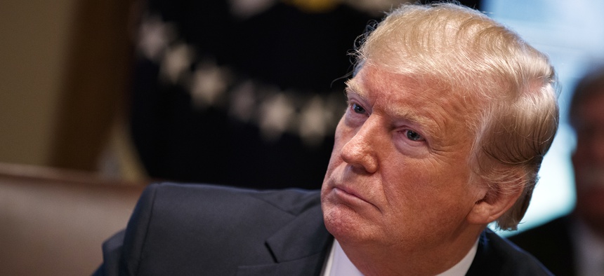 President Donald Trump listens during a cabinet meeting at the White House, Wednesday, Jan. 2, 2019, in Washington.