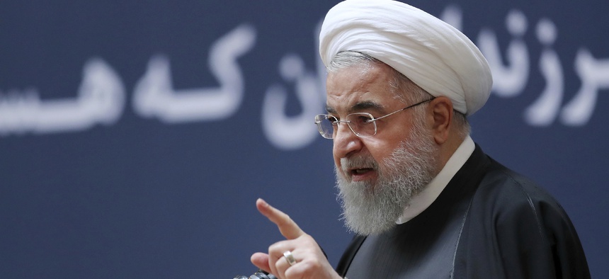 In this photo released by official website of the office of the Iranian Presidency, President Hassan Rouhani speaks at a ceremony to mark the second anniversary of the death of former Iranian President Akbar Hashemi Rafsanjani, in Tehran, Iran,