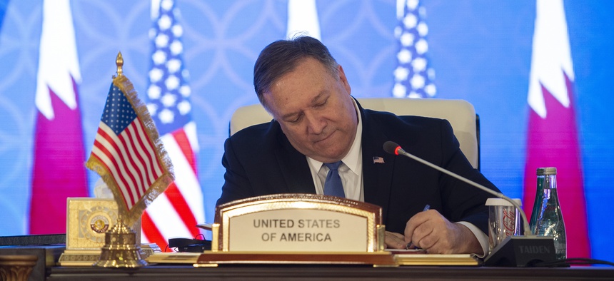 US Secretary of State Mike Pompeo signs a memorandum of understanding and statement of intent with Mohammed bin Abdulrahman bin Jassim Al Thani, the Deputy Prime Minister and Qatari Minister of Foreign Affairs, in Doha, Qatar, January 13, 2019.