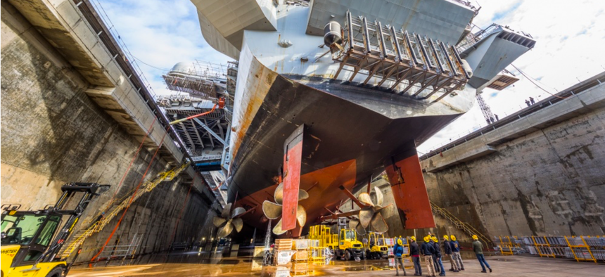 USS Nimitz (CVN 68) in Dry Dock 6 post dewatering at Puget Sound Naval Shipyard & Intermediate Maintenance Facility in Bremerton, Wash., March 5, 2018.