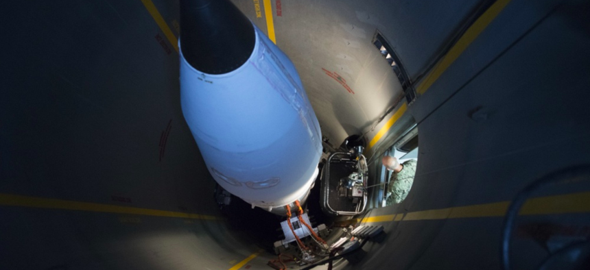 Navy Capt. Frank Bradley, executive assistant to Gen. Joseph F. Dunford Jr., chairman of the Joint Chiefs of Staff, tours the 49th Missile Defense Battalion at Fort Greeley, Alaska, Aug. 19, 2017.
