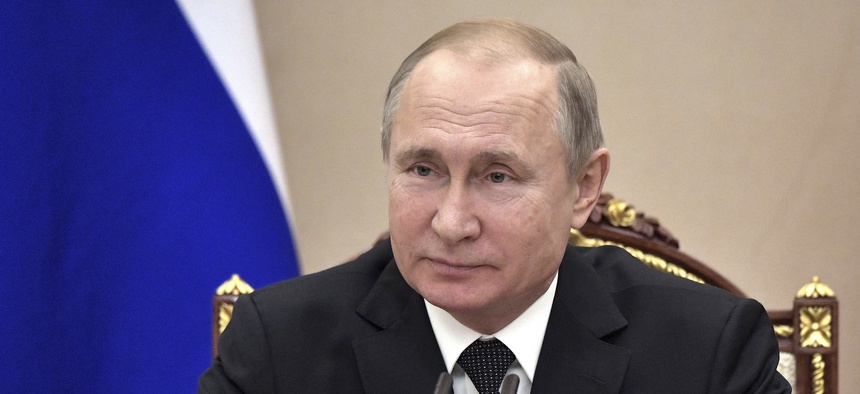 Russian President Vladimir Putin chairs a Security Council meeting in Moscow, Friday, Feb. 1, 2019.