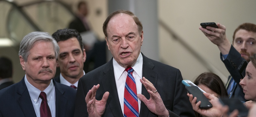 From left, Sen. John Hoeven, R-N.D., Rep. Tom Graves, R-Ga., and Sen. Richard Shelby, R-Ala., the top Republican of bipartisan bargainers working to avoiding another government shutdown, speak with reporters in Washington on Feb. 6, 2019.