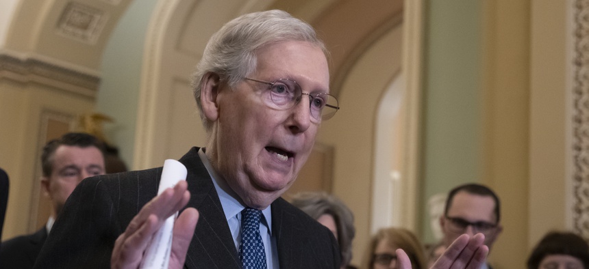Senate Majority Leader Mitch McConnell, R-Ky., speaks to reporters asking about the threat of another government shutdown following their weekly strategy meeting, at the Capitol in Washington, Tuesday, Jan. 29, 2019.