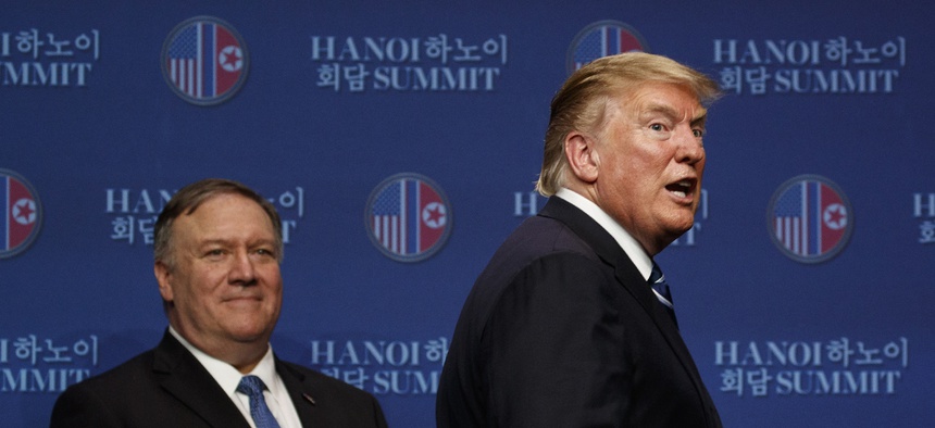 President Donald Trump, with Sec. of State Mike Pompeo, concludes a news conference after a summit with North Korean leader Kim Jong Un, Thursday, Feb. 28, 2019, in Hanoi.