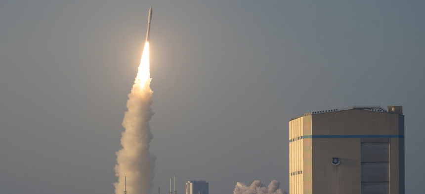 A United Launch Alliance Atlas V rocket launches into the air from Launch Complex 41 during the Air Force Space Command 11 launch at Cape Canaveral Air Force Station, Florida, April 14, 2018.