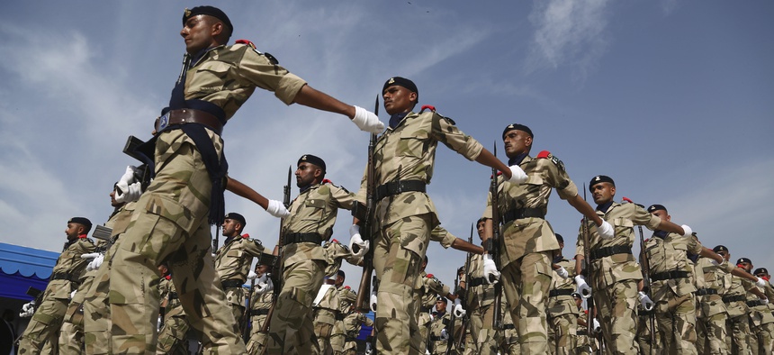 Commandos of Pakistan's Coast Guards take part in a passing out parade ceremony in Karachi, Pakistan Thursday, Feb. 22, 2018. They are specially trained to counter terrorism which grips Pakistan.
