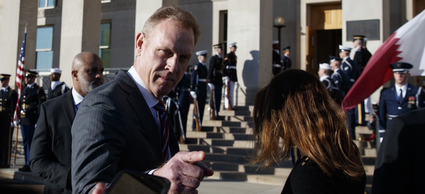 Acting Secretary of Defense Patrick Shanahan talks to media before the arrival of Qatari Minister of Defense Khalid bin Mohammed al-Attiyah, at the Pentagon, Tuesday, March 12, 2019.