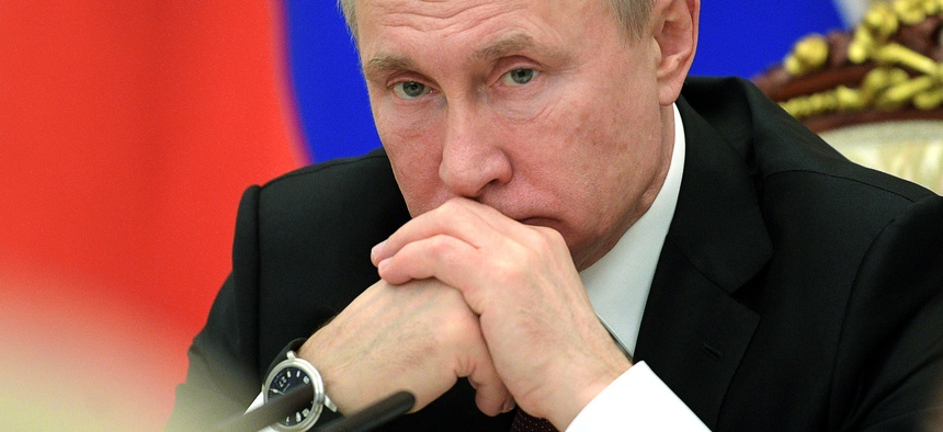 Russian President Vladimir Putin chairs a cabinet meeting in the Kremlin in Moscow, Wednesday, Feb. 27, 2019.