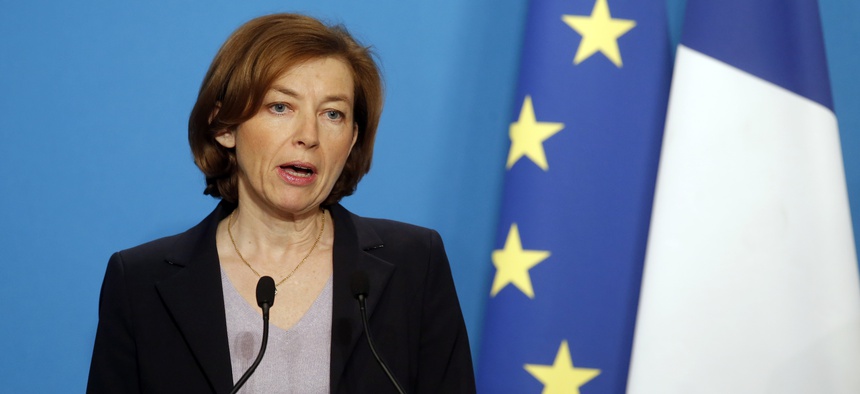 French Defense Minister Florence Parly gives an official statement in the press room after attending an emergency meeting with French President Emmanuel Macron at the Elysee Palace, in Paris, France, Saturday, April 14, 2018.