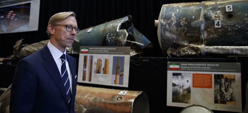 Brian Hook, U.S. special representative for Iran, walks past fragments of Iranian short range ballistic missiles (Qiam) at the Iranian Materiel Display (IMD) at Joint Base Anacostia-Bolling, in Washington, Thursday Nov. 29, 2018.