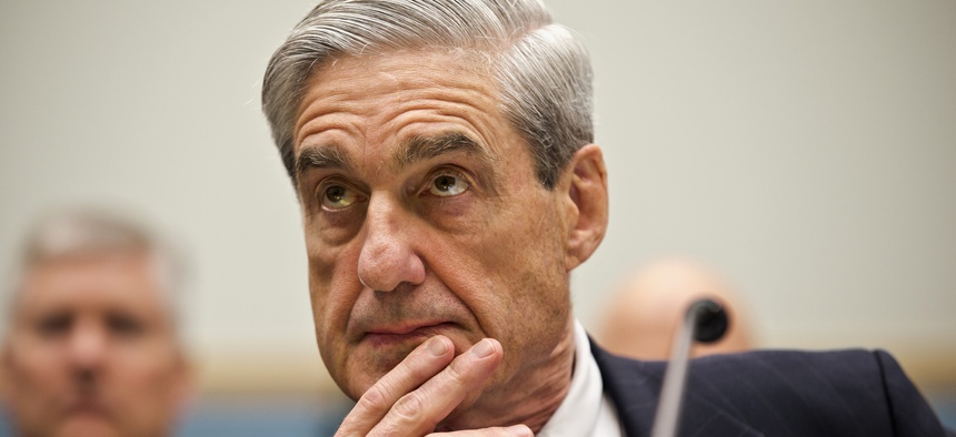 FBI Director Robert Mueller listens as he testifies on Capitol Hill in Washington, Thursday, June 13, 2013, as the House Judiciary Committee held an oversight hearing on the FBI.