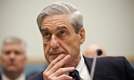 FBI Director Robert Mueller listens as he testifies on Capitol Hill in Washington, Thursday, June 13, 2013, as the House Judiciary Committee held an oversight hearing on the FBI. FBI Director Robert Mueller listens as he testifies on Capitol Hill in Washington, Thursday, June 13, 2013, as the House Judiciary Committee held an oversight hearing on the FBI.