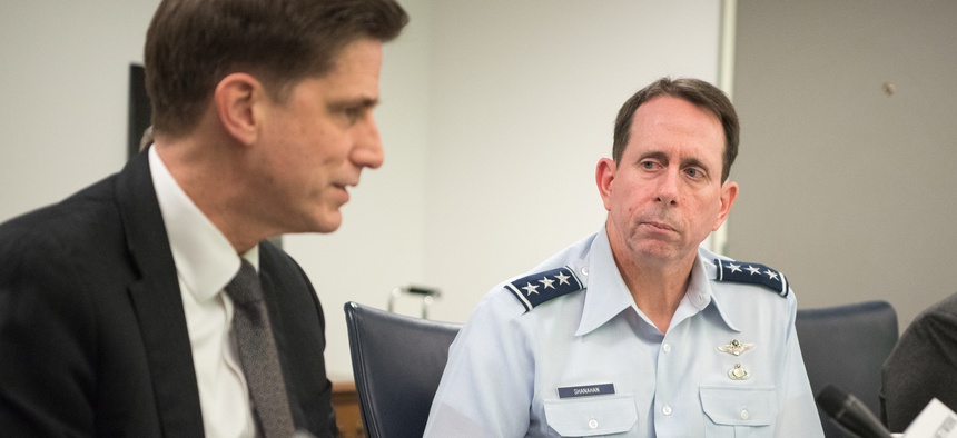DOD Chief Information Officer Dana Deasy, left, and the Director of the Joint Artificial Intelligence Center, Lt. Gen. Jack Shanahan, hold a round table meeting at the Pentagon on Feb. 12, 2019.