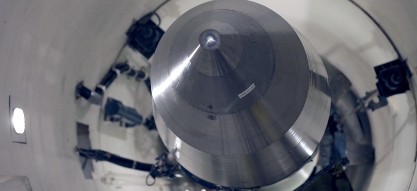 An inert Minuteman III missile in a training launch tube at Minot Air Force Base, N.D. in this file photo from June 25, 2014.