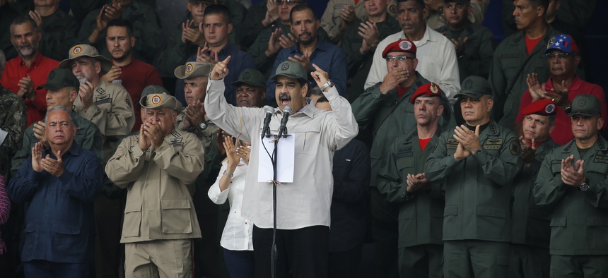 Venezuela's President Nicolas Maduro, speaks during the tenth anniversary celebration of the Bolivarian militia in Caracas, Venezuela, Saturday, April 13, 2019.