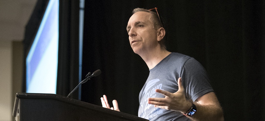 Defense Digital Service Director Chris Lynch speak during the JEDI Cloud Industry Day in Arlington, Va. March 7, 2018.